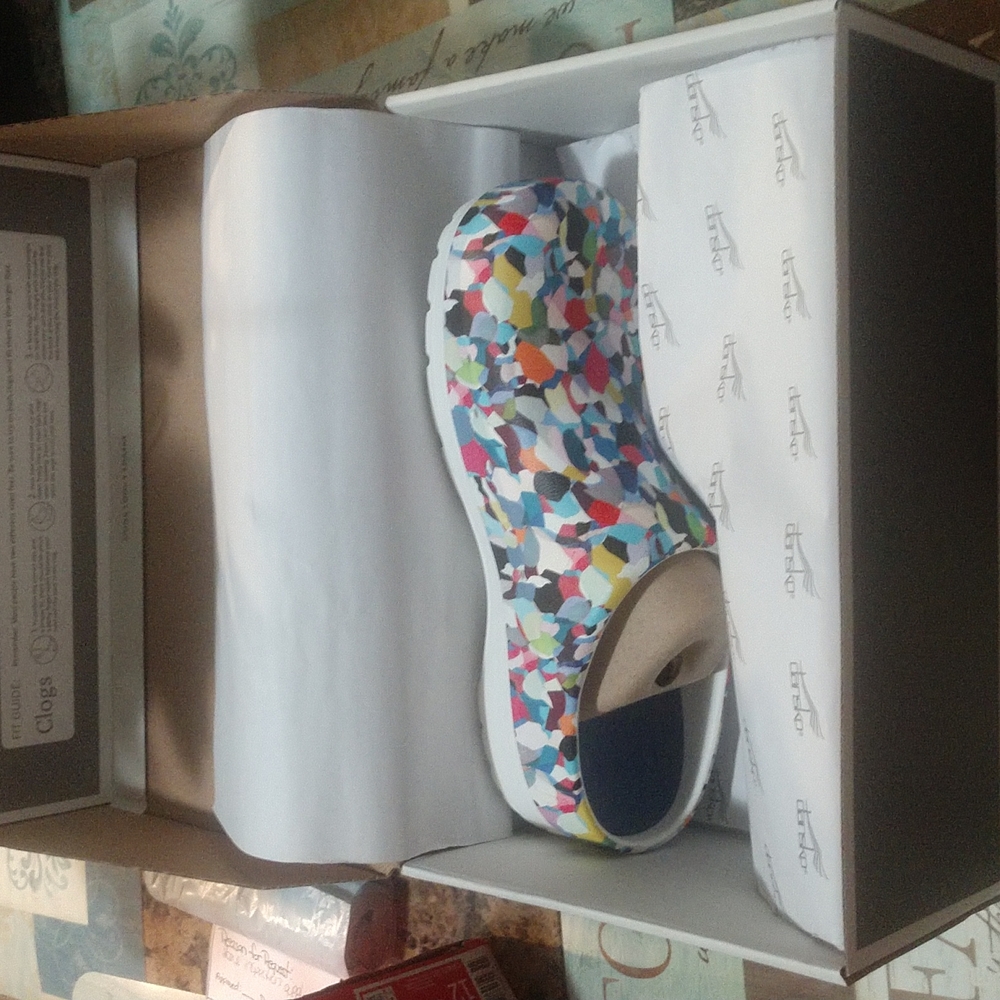 Dansko clogs that are multi colors size 38